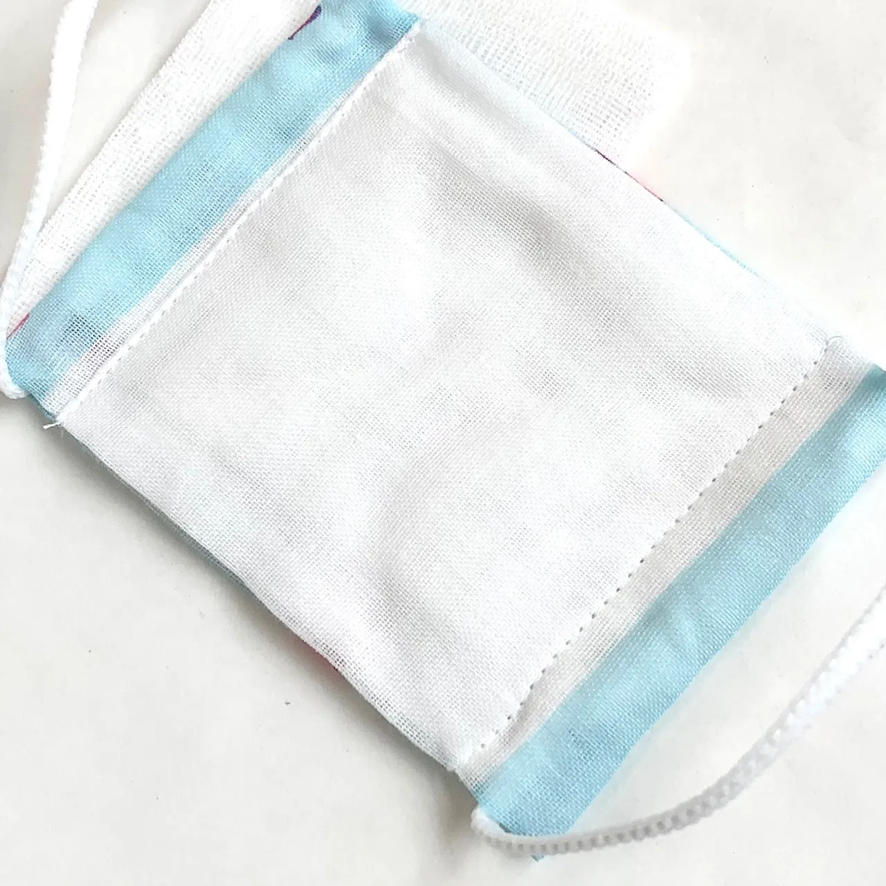 X 277935 Kamio Unicorn Tapioca Face Mask-DISCONTINUED